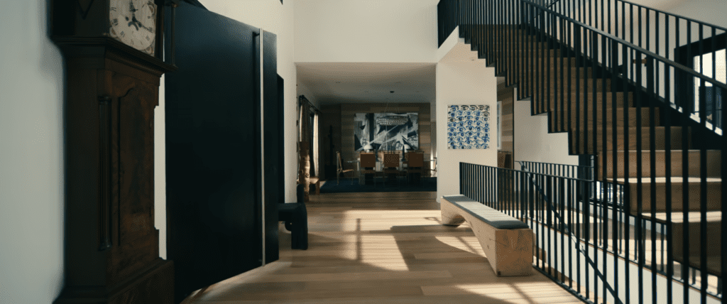 Entry Way Stairs Leave the world behind Minimalist hallway with wooden floors.