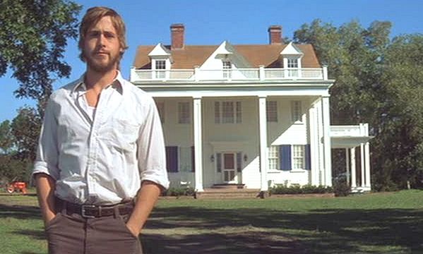 Ryan Gossling standing in front of the Notebook House